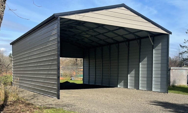 Metal shed with gravel floor, open front view.