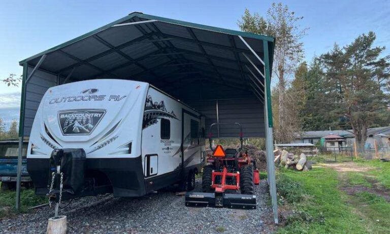 RV and tractor parked in covered outdoor space