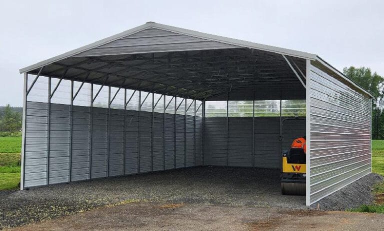 Large metal carport with open sides and roof