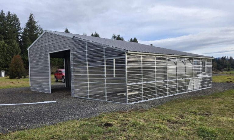 New metal barn structure in rural area
