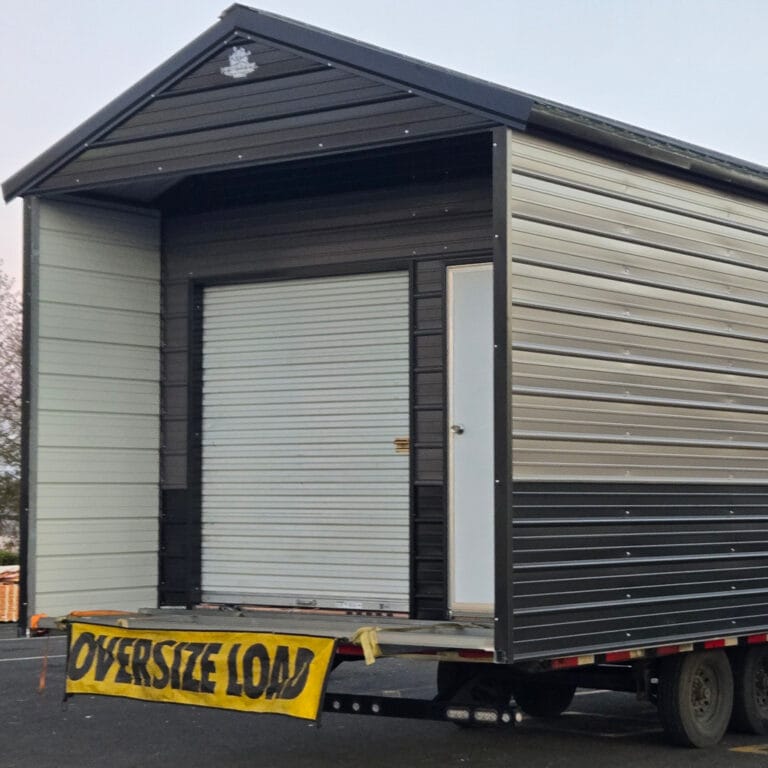 Oversize load mobile home on trailer for transport.