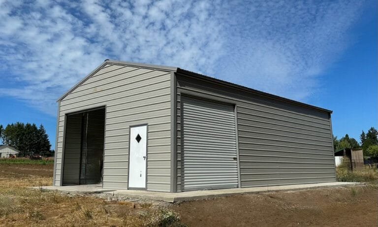 Metal garage building under blue sky